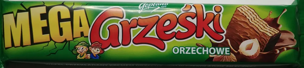 Wafel przekładany kremem orzechowym w czekoladzie mlecznej.