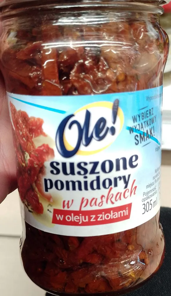 Suszone pomidory w paskach w oleju z ziołami