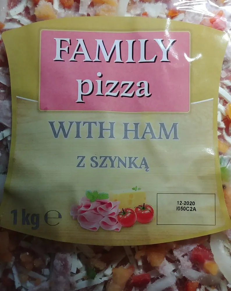 Pizza z szynką wieprzową, na podpieczonym spodzie.