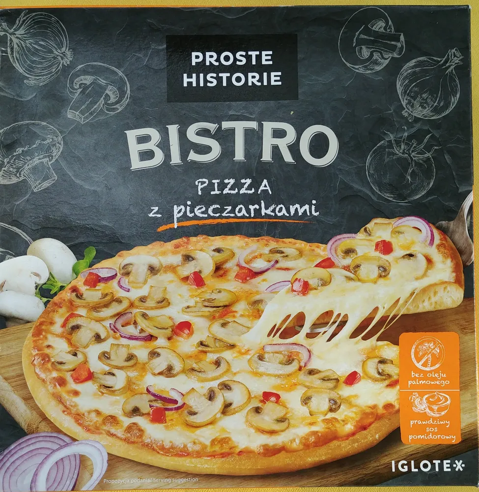 Pizza z pieczarkami na podpieczonym spodzie. Produkt głęboko mrożony.