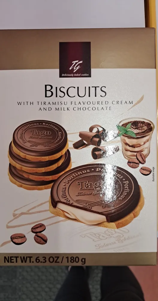 Deliciously baked cookies biscuits with tiramisu flavored cream covered with chocolate