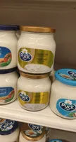 Puck spreadable processed cream cheese analogue cheddar taste