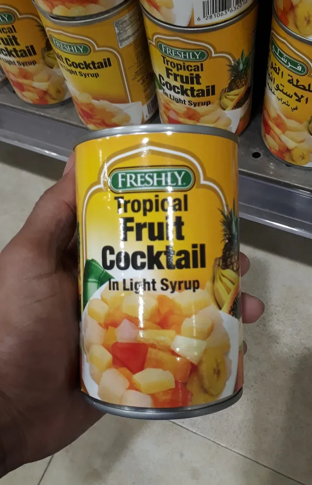 Freshly tropical fruit cocktail in light syrup