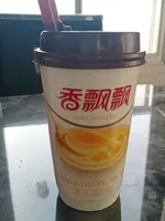 Thé au lait saveur mangue