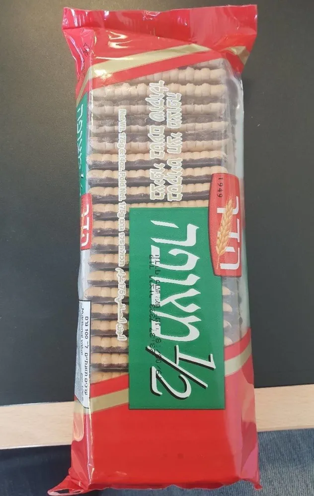 Half coated biscuits with chocolate flavored coating