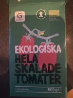 ekologiska hela skalade tomater