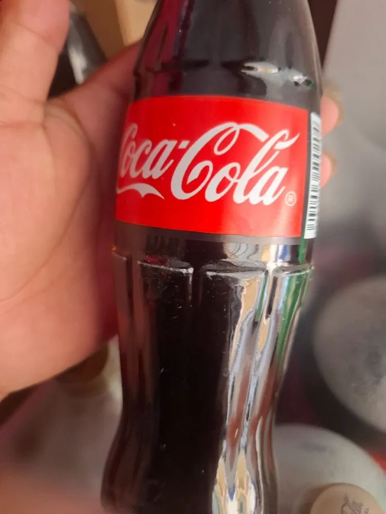 Caja coca 12 oz botella