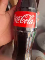 Caja coca 12 oz botella