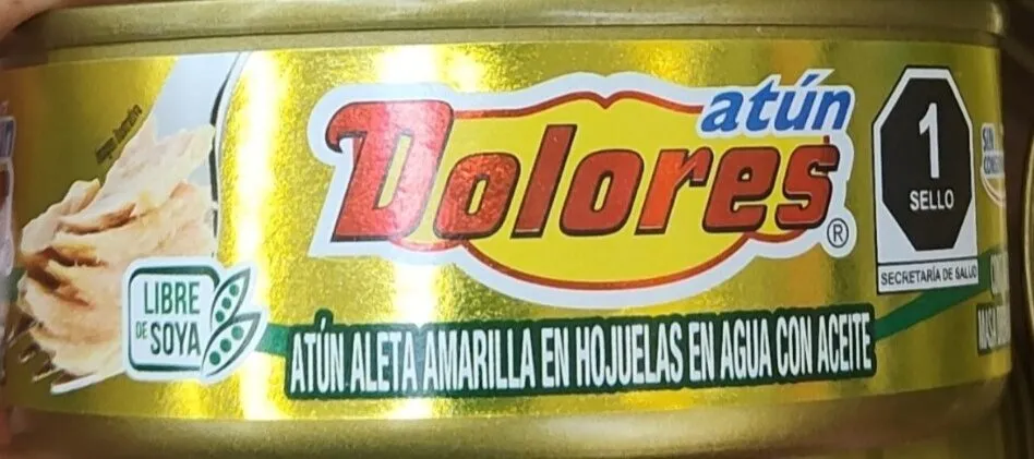 Atún aleta amarilla en hojuelas en agua con aceite
