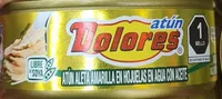 Atún aleta amarilla en hojuelas en agua con aceite