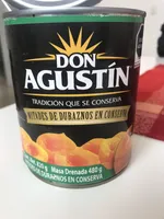 Mitades de durazno en conserva