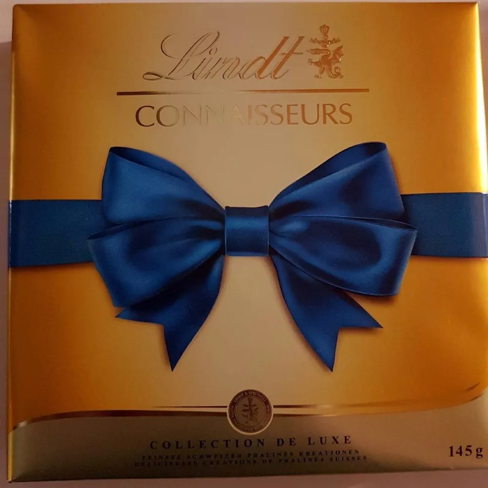 Connaisseurs - Assortiment de bonbons de chocolats suisses fourrés