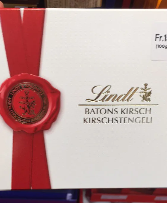 Sprüngli Batons de chocolat, fourrés au Kirsch liquide