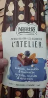 Chocolat noir aux myrtilles confites, noisettes et amandes