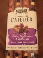 L'atelier chocolate con leche pasas almendras y avellanas