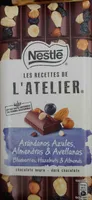 L'Atelier chocolate negro, arándanos azules, almendras y avellanas