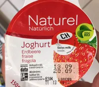 Naturel Yogourt avec fraises de graisse dans la parie lactique