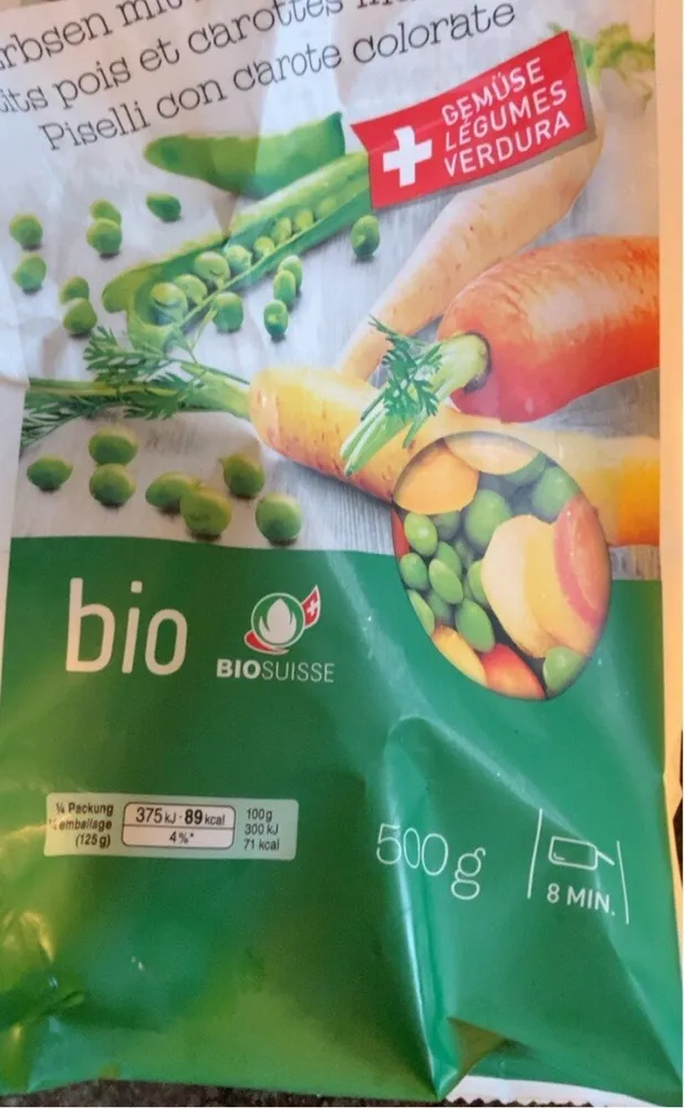 Petits pois et carottes multicolores