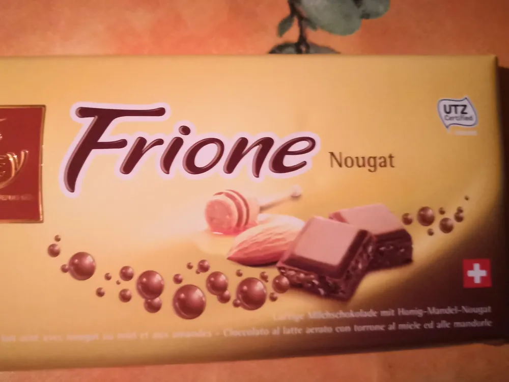 Frione Chocolat au lait aéré avec nougat du miel aux amandes