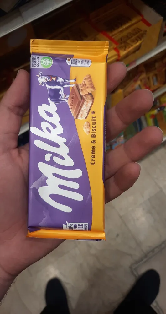t ko Milka cream & biscuit