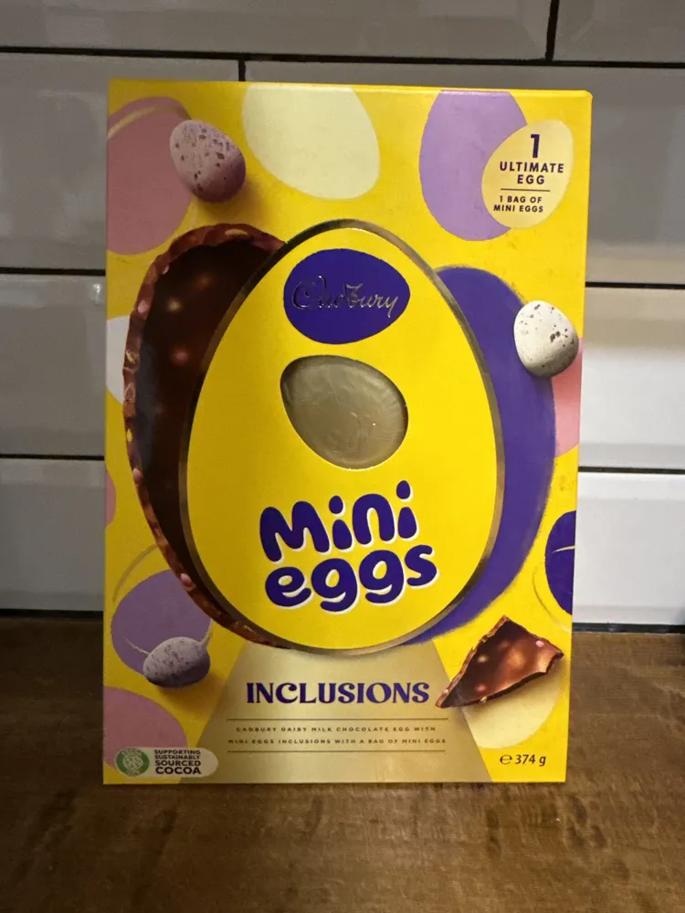 INCLUSIONS CADBURY DAIRY MILK CHOCOLATE EGG WITH MINI EGGS INCLUSIONS WITH A BAG OF MINI EGGS
