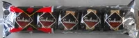 Chocolat Noir Recourt d'éclats de noisettes fourré (60%) au Praline Noisettes