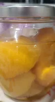 Pesche mezze allo sciroppo