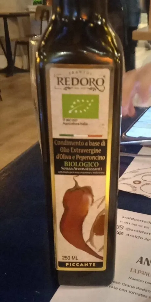 Condimento a base di olio extra vergine di oliva e peperoncino