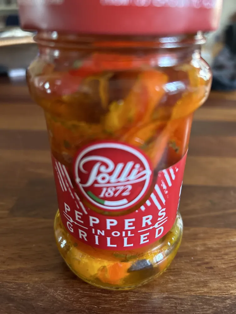 Grilled peppers in oil