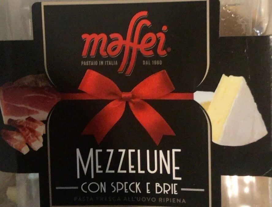 Mezzelune con speck e brie