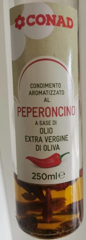 Olio extra vergine di oliva. Aromatizzato al peperoncino.