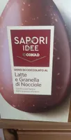 Uovo di cioccolato al latte e granella di nocciole