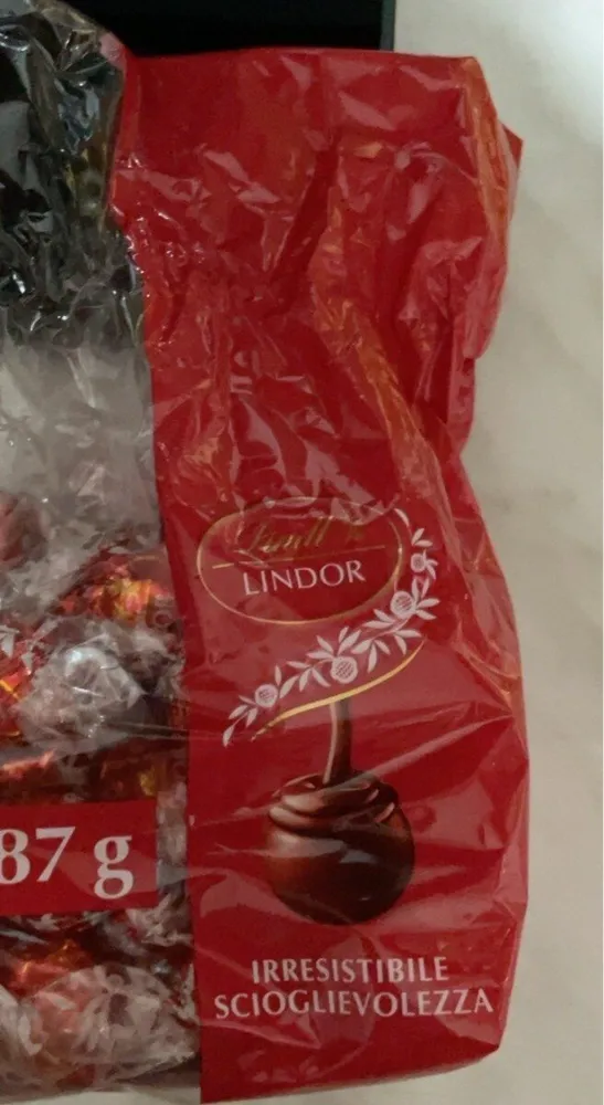 Praline con cioccolato al latte e morbido ripieno