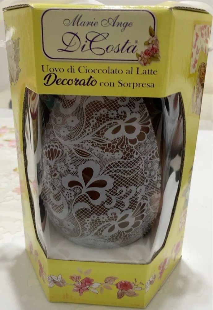 Uovo di cioccolato al Latte decorato con sorpresa