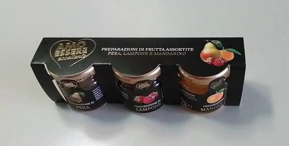 Preparazione di frutta assortite pera lampone mandarino