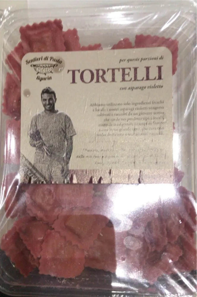 Tortelli con asparago violetto