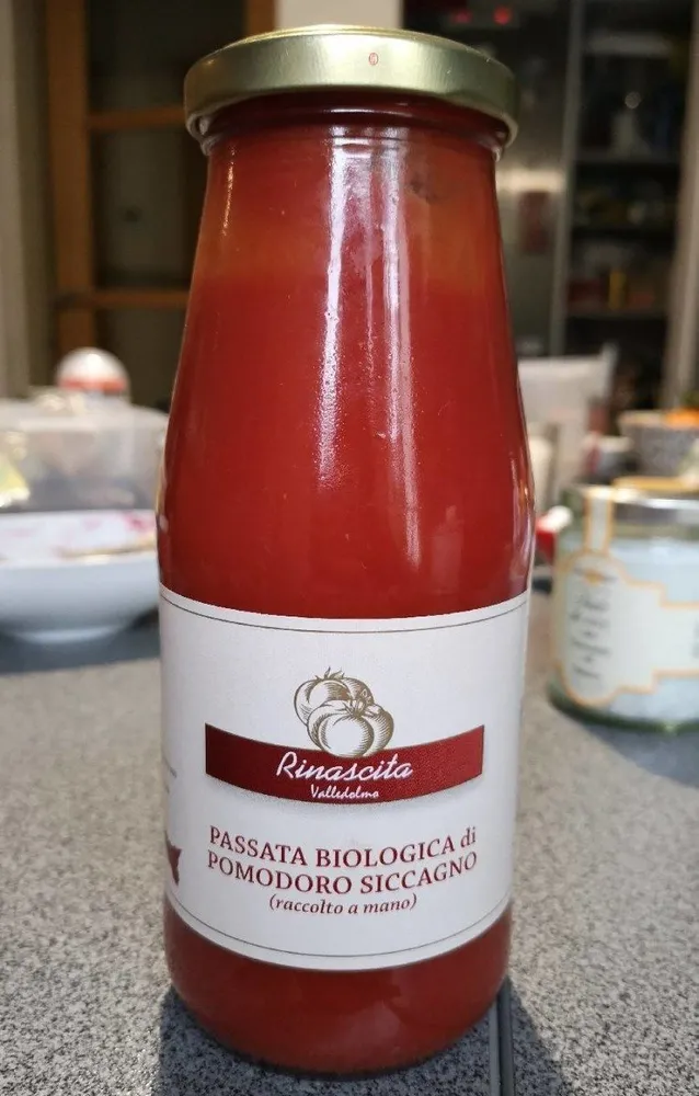 Passata biologica Di pomodoro siccagno