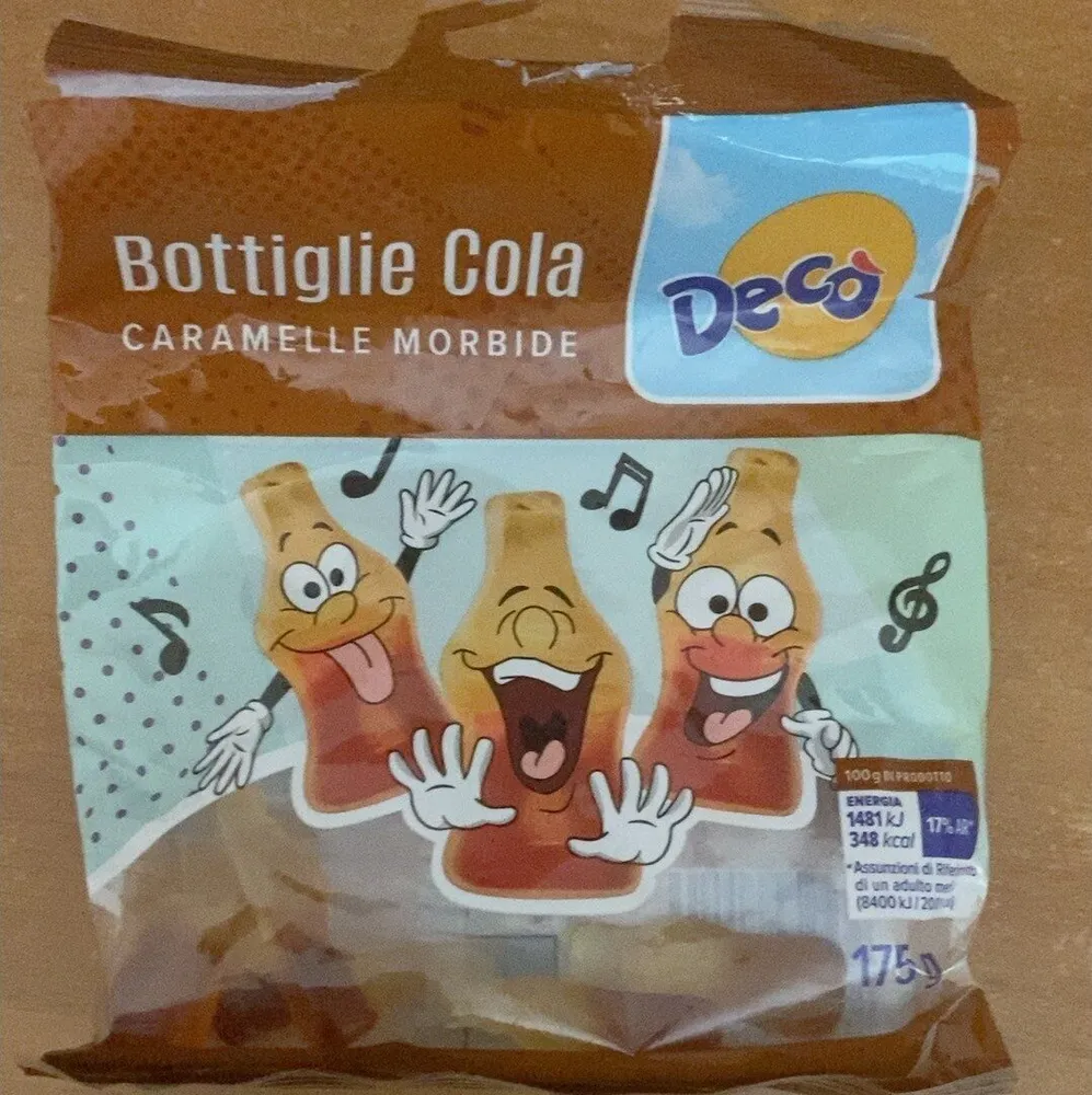 Bottiglie cola, caramelle gommose