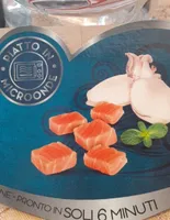 Ravioli ripieni di seppia con salmone e menta