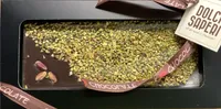 Tavolozza di cioccolato fondente con pistacchio