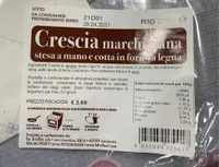 crescia marchigiana stesa α mano e cotta in forno α legna