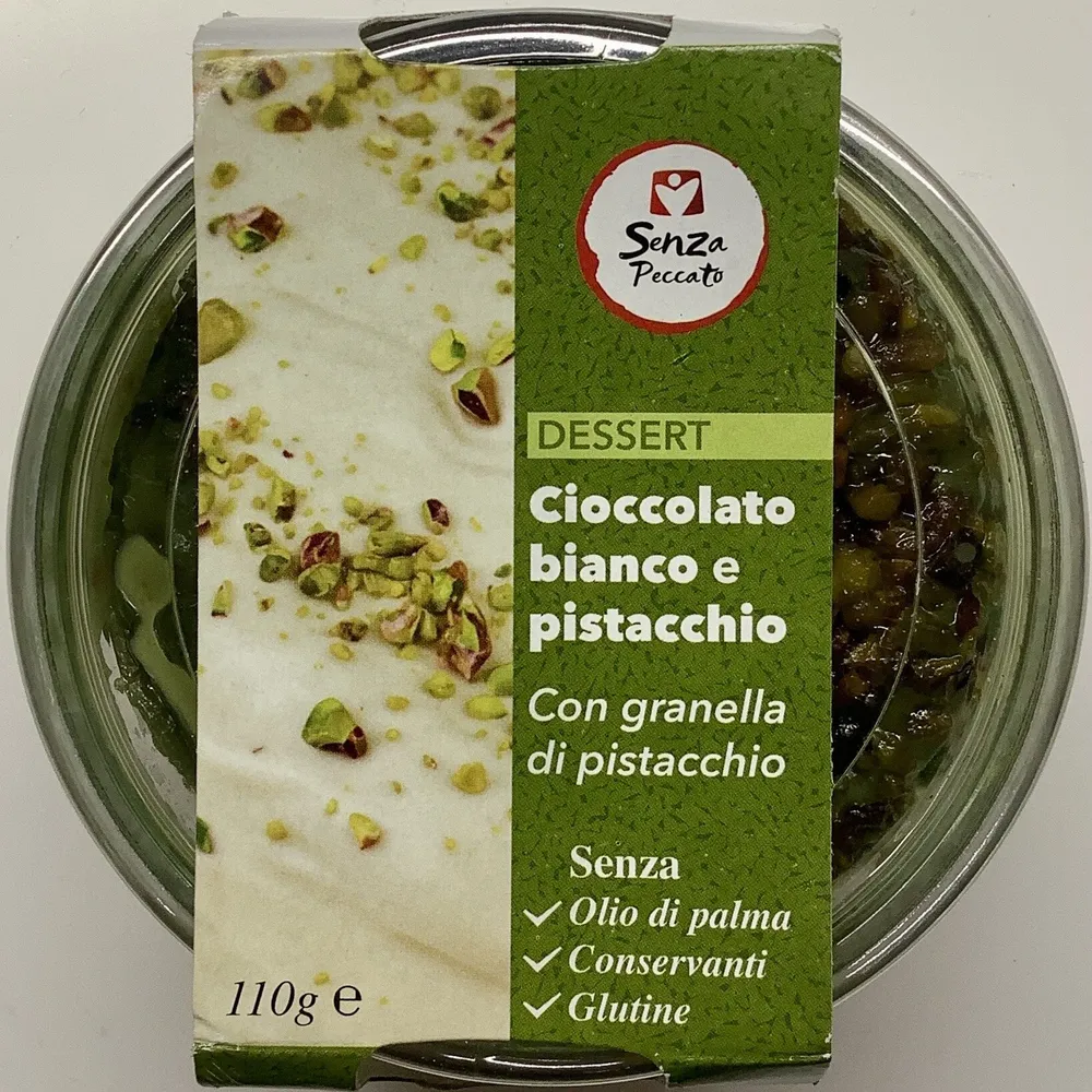 Dessert cioccolato bianco e pistacchio con granella di pistacchio