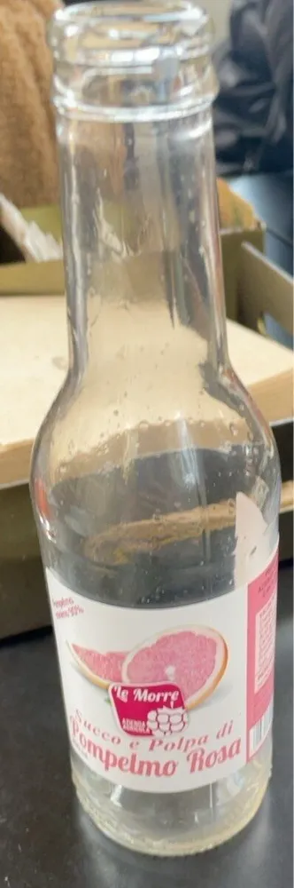 Succo e polpa di pompelmo rosa