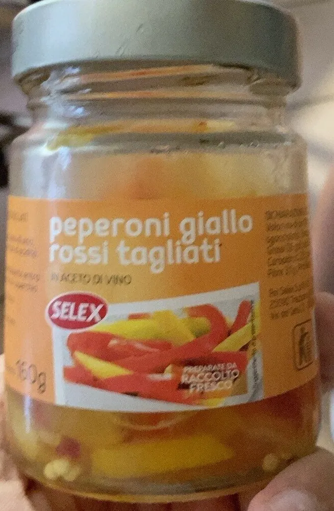 Peperoni rossi e gialli in aceto di vino