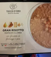 Gran risotto con fonduta di formaggi e pere
