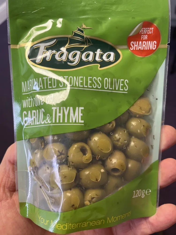 Aceitunas verdes deshuesadas con aceite de oliva ajo y tomillo