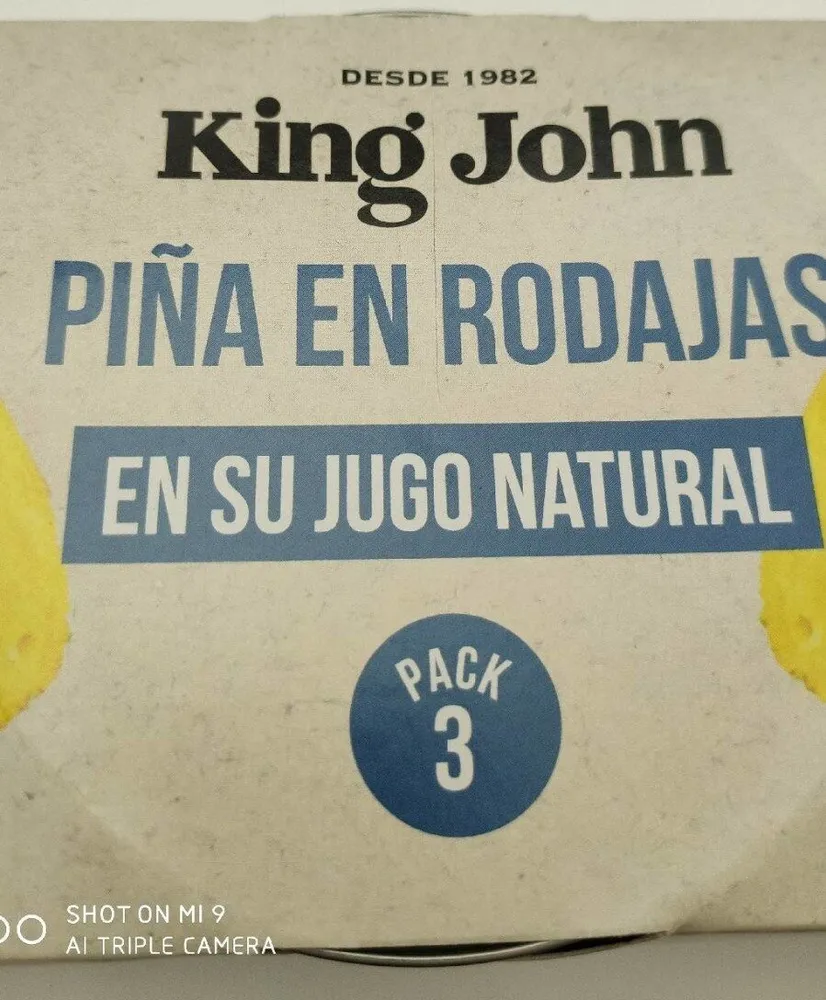 Piña en rodajas en su jugo natural