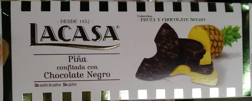 Piña confitada con chocolate negro
