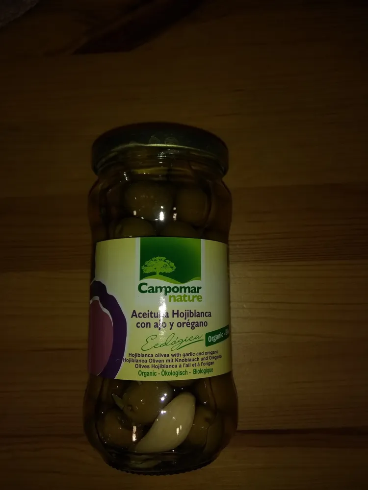 Aceituna hojiblanca morada ecológica con ajo y orégano