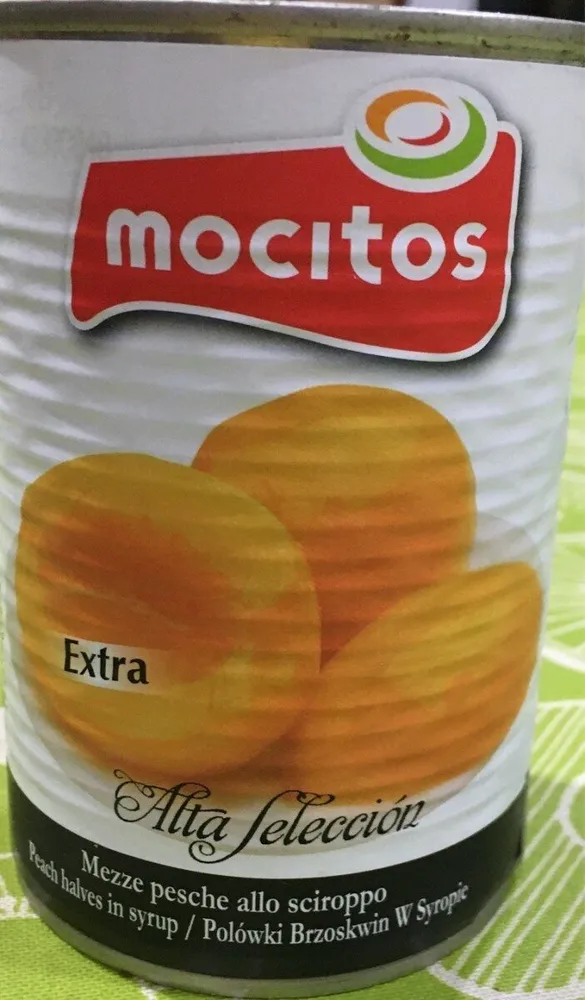 Mitades de melocoton en almibar